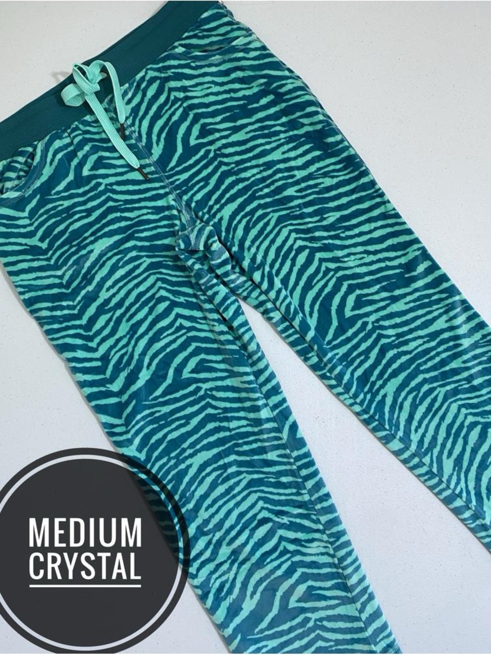 LuLaRoe Teal Zebra Print Capri pants